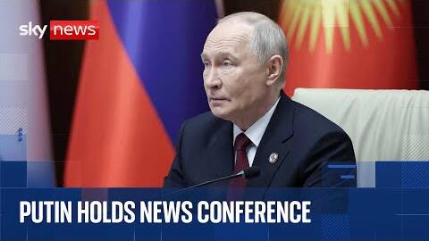 Vladimir Putin holds news conference at security summit