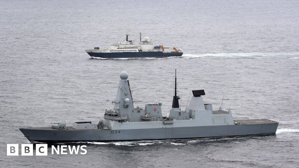 Russian spy ship on edge of UK waters, defence secretary says