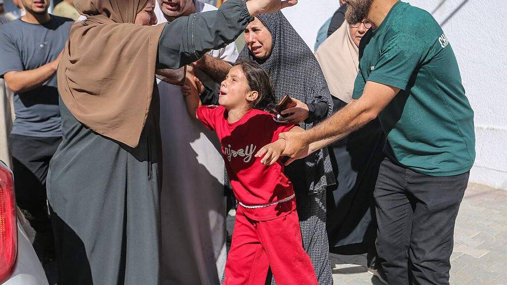 Israeli fire kills four in Gaza, mediators hold more ceasefire talks