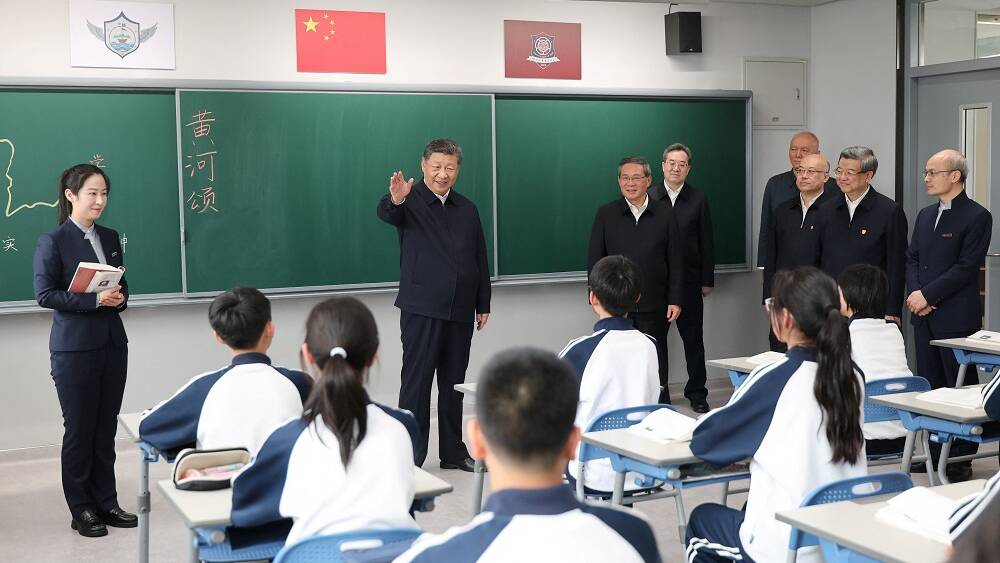 China announces policy to ease academic pressure on students