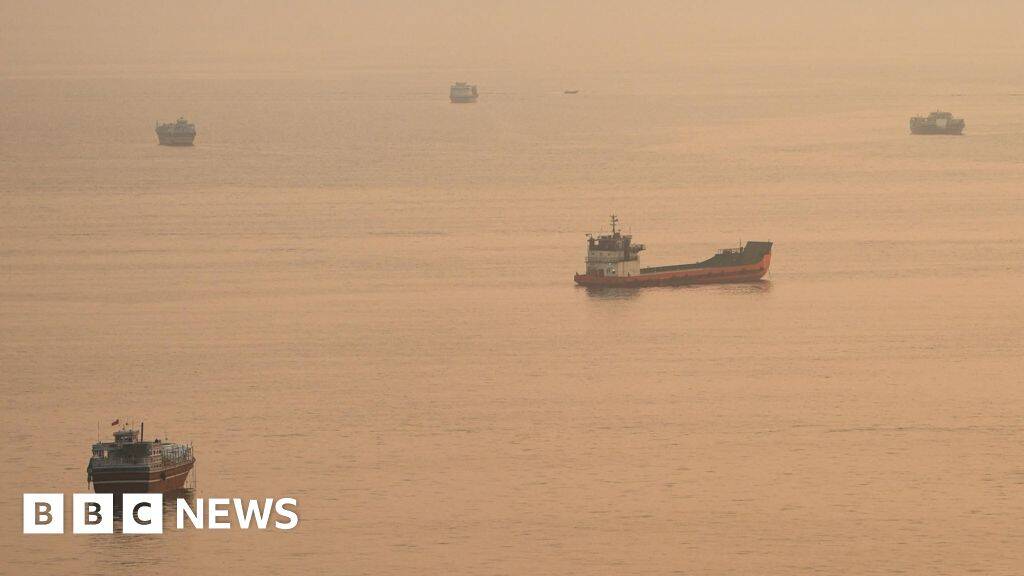 Container ship hit by projectile sinks in Strait of Hormuz, Singapore says