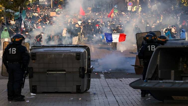 Violence flares in Paris after largely peaceful protests in France