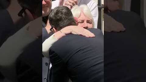 New PM's long hug from his mum