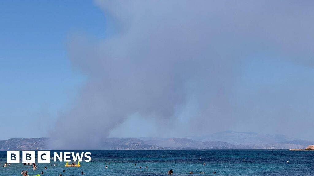 Two dead and evacuation under way as fires break out on Greek island