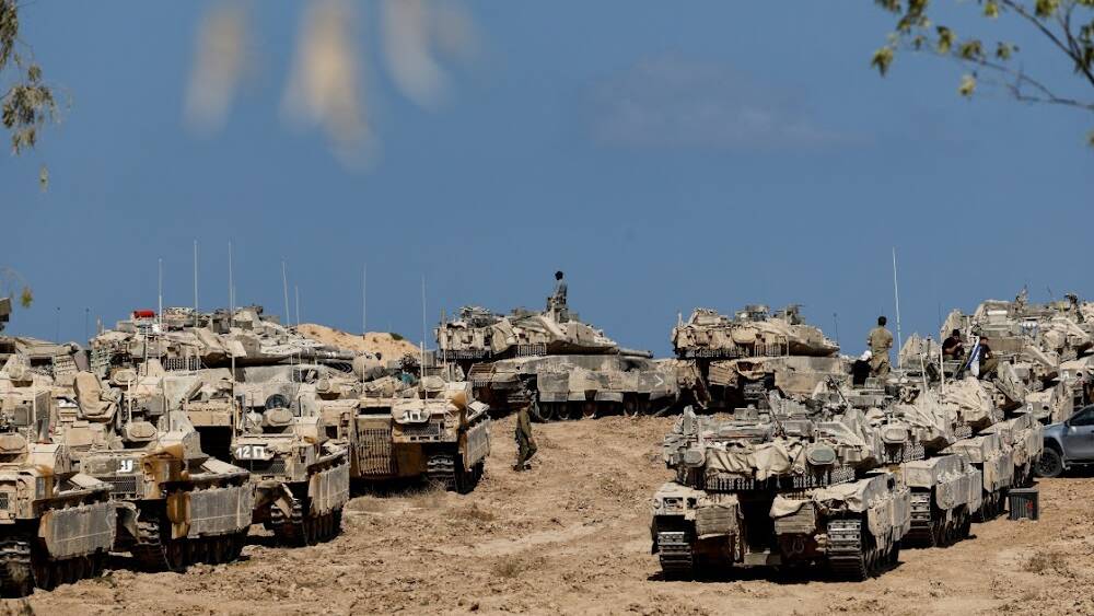 Israel opens new route out of Gaza City for 48 hours as tanks advance