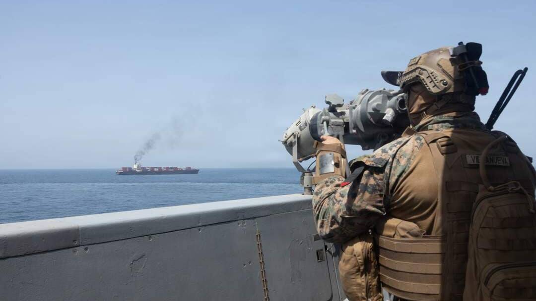 Iran fires 'warning shots' as US Navy says its ships entered Gulf via Hormuz