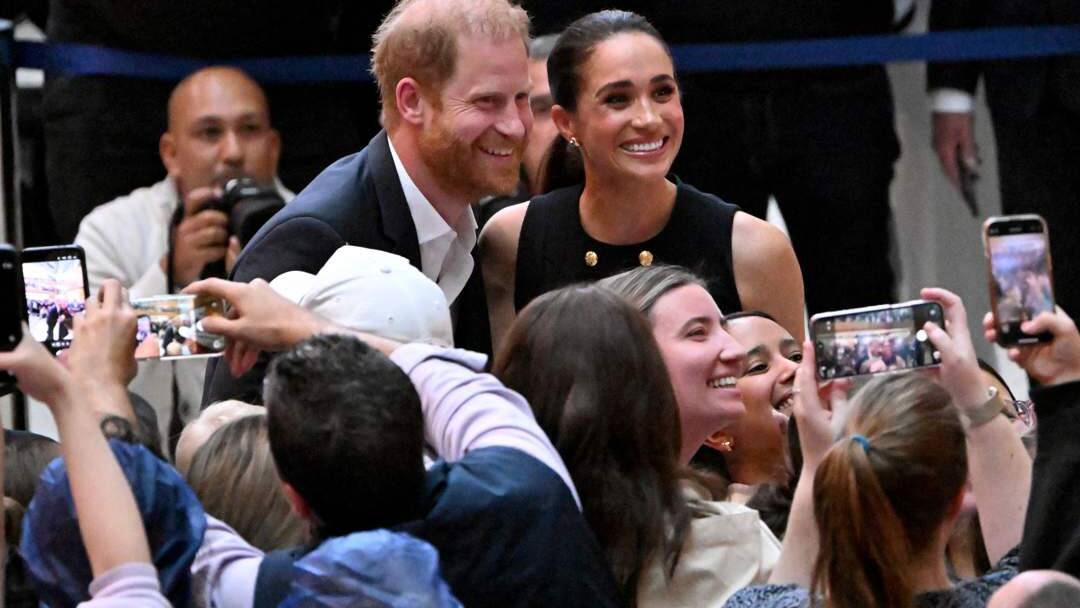 PHOTOS | Prince Harry and Meghan visit Australia in first trip since royal rift