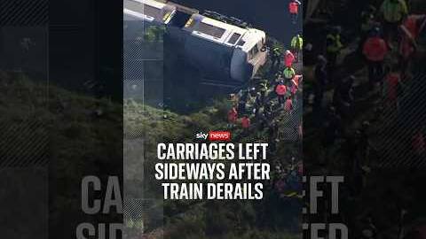 Carriages left sideways after train derails