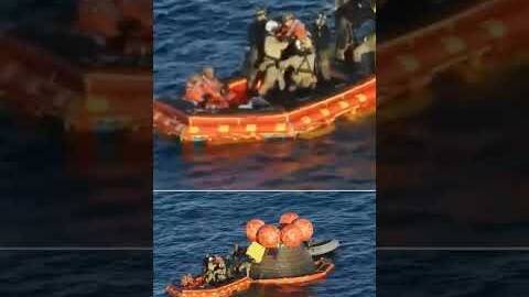 Astronauts emerge from capsule for first time