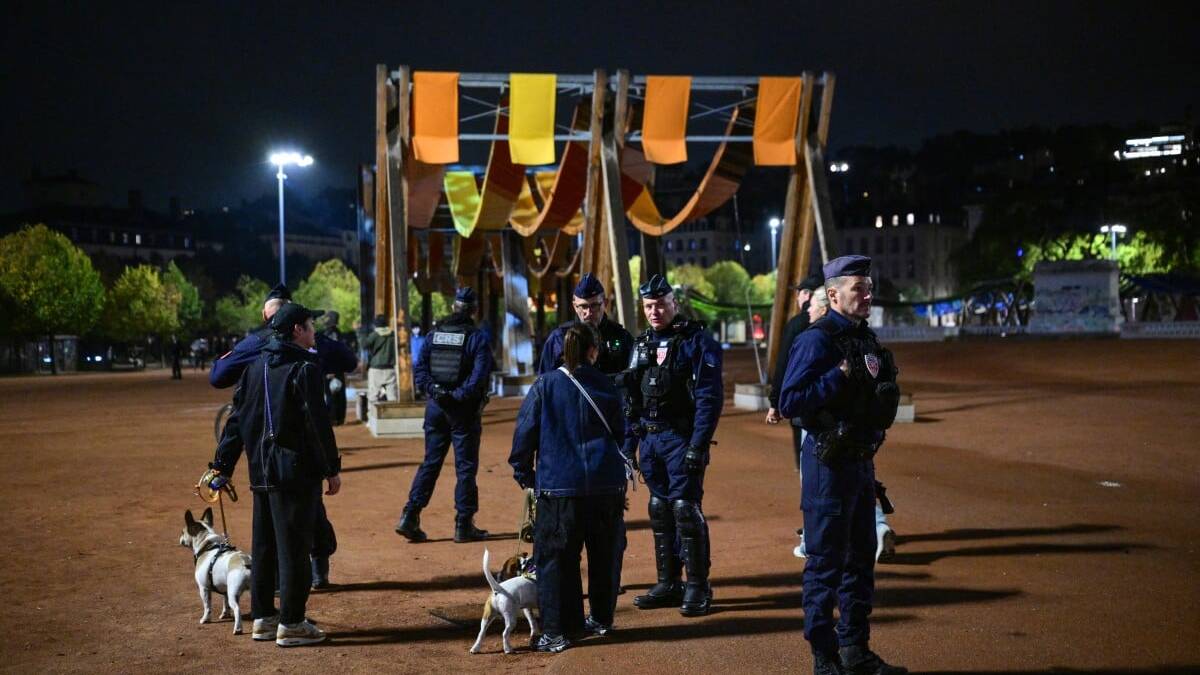 France arrests man, calls in anti-terror police over town hall protest fire
