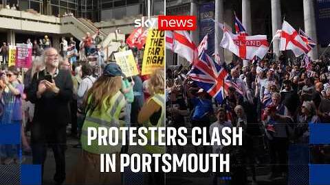 Anti-migrant demonstrators clash with counter-protesters during march in Portsmouth