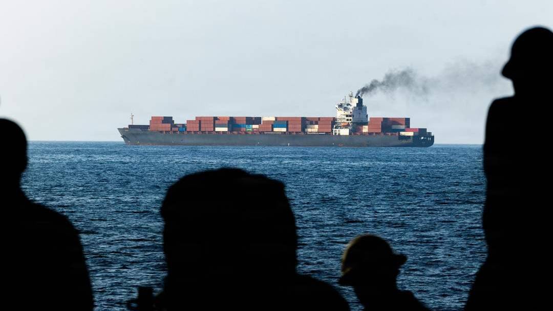 Chinese-owned oil tanker hit near Hormuz as US pauses ship-protection plan, report says