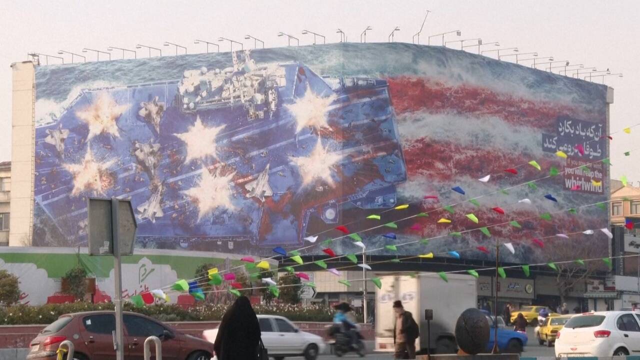 Iran unveils mural warning US not to launch military strike