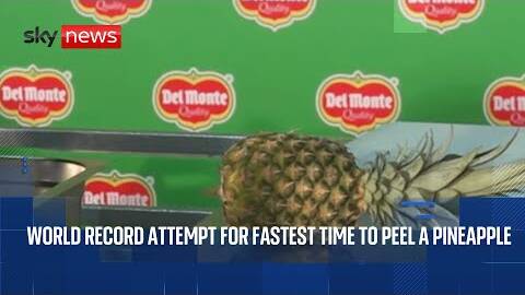 Guinness World Records attempt for fastest time to peel and slice a pineapple