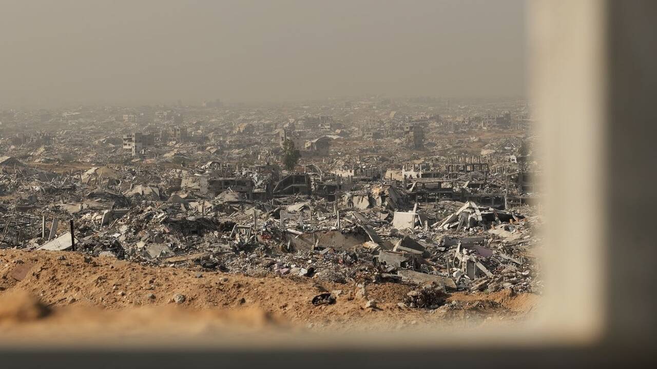 'Patchwork of dust and misery': At the Yellow Line dividing Gaza - where all that remains are skeletons of buildings