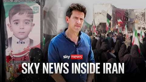 On the ground from the cemetery where children were buried after strike on Iranian school