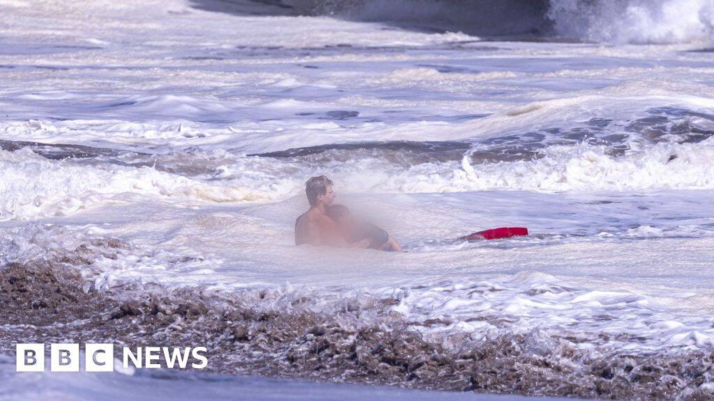 Bystander video shows teen lifeguard's dramatic ocean rescue