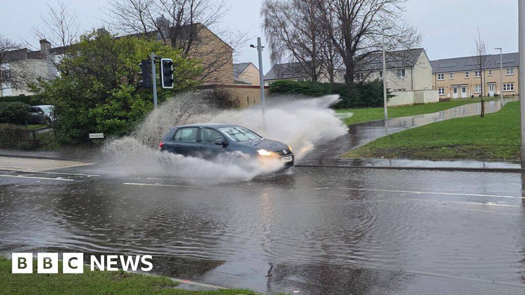 Ice and flood warnings for parts of UK as cool weather continues