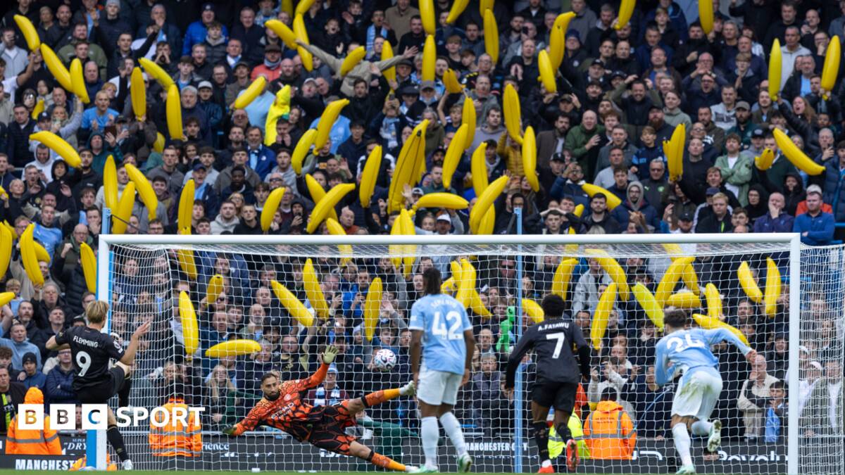 Boos and bananas on day of defiance at Man City