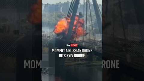 Moment a Russian drone hits Kyiv bridge