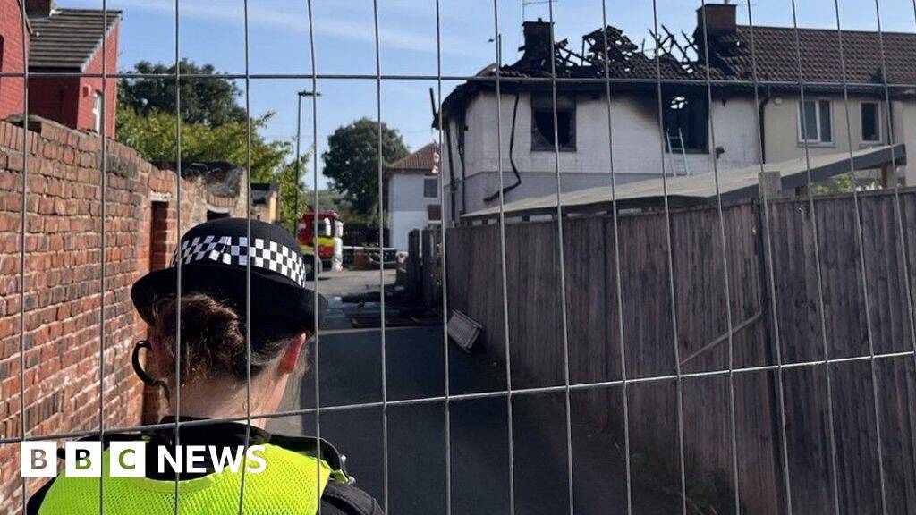 Murder probe as two people dead in house fire