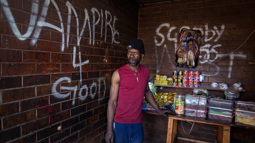 Families live with rubbish and rats in Joburg stadium