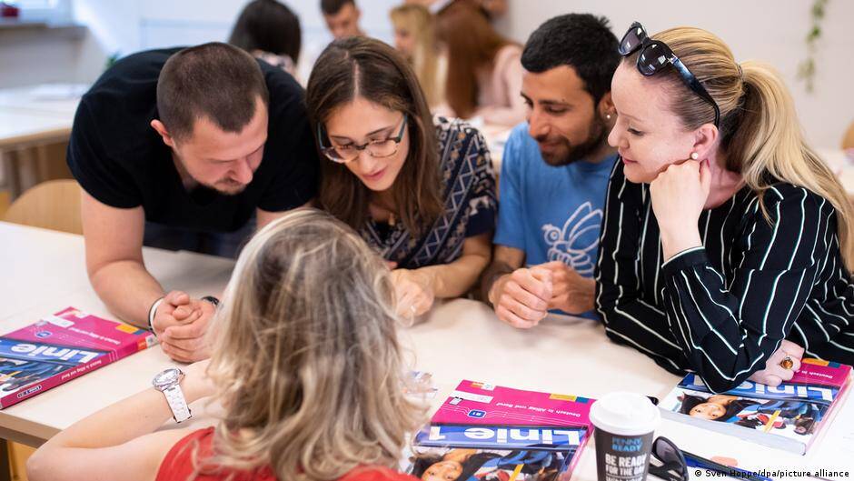 Germany cuts funding for integration of refugees