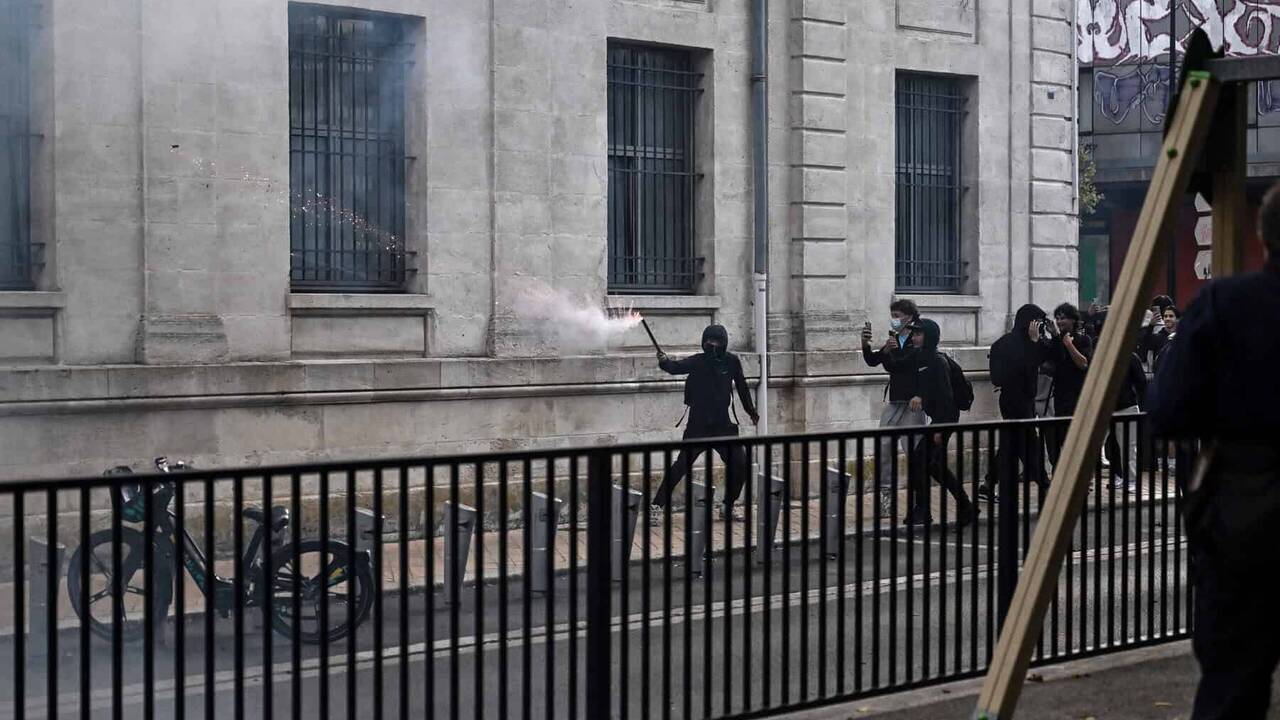 Teenager loses hand picking up grenade in France school protests