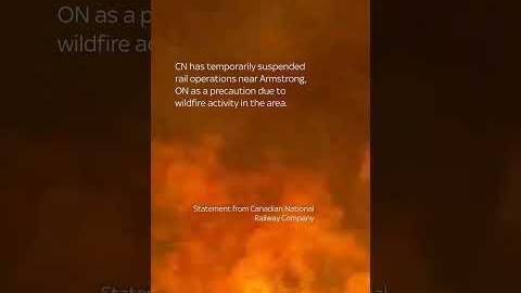 Train engulfed by wall of flames in Canada wildfire